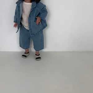 Toddler denim jacket and pants set detail, cute baby denim outfit showcasing style.