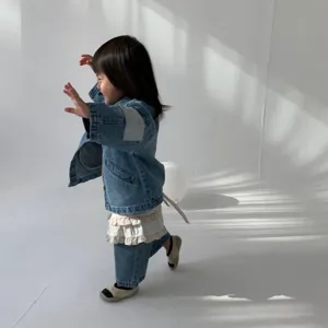 Cute toddler denim jacket and jeans set detail shot showing stylish Korean kids clothing design.