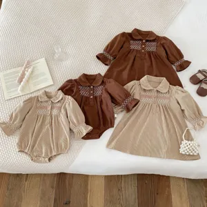 Corduroy baby toddler long sleeve dress and romper set, cute smocked embroidery design for autumn.
