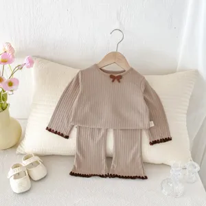 Infant baby girl ribbed long sleeve top and flared pants set detail view in autumn style.
