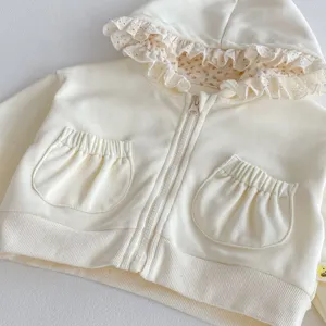 Schattige baby en peuter jas met rits en capuchon met bloemenprint voering crème