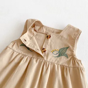 Infant baby girl cute embroidered top detail, casual beige cotton toddler clothing.