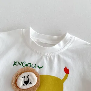 Infant short sleeve white t-shirt detail view, cute cartoon lion design, soft cotton.