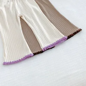 Baby girls ribbed flare pants detail, cute lettuce edge trim, soft cotton casual toddler trousers.