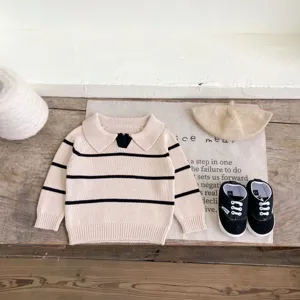 Infant baby knitted sweater with lapel collar and classic black stripes for autumn season.