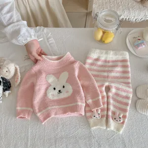 Cozy fleece baby pajama set with cute rabbit design, warm winter sleepwear for toddlers.
