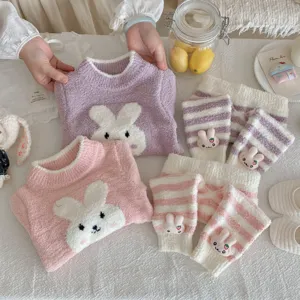 Cute baby winter fluffy fleece rabbit pajama set with cozy top and striped pants detail.