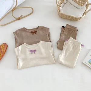 Cute baby girl ribbed top and pants set, comfortable autumn toddler two-piece outfit.