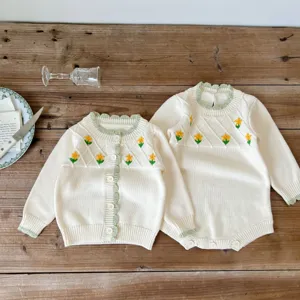Baby toddler knit cardigan romper handmade floral embroidery beige long sleeve detail view