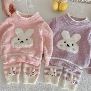 Detailed view of the cute baby winter fleece pajama set featuring soft rabbit design details.