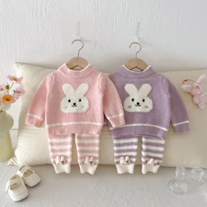 Details of cute baby fleece rabbit pajama sets, soft plush winter sleepwear for kids.