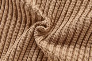 Detail of the khaki baby knitted romper fabric, featuring soft long sleeve material texture.