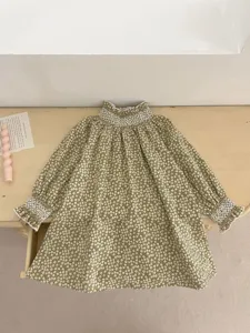 Cute infant toddler girls floral long sleeve dress with smocked lace collar and cuffs for spring.