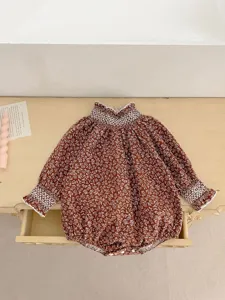 Infant baby girl long sleeve floral romper detail, vintage brown print smocked collar.