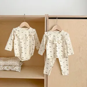 Baby girl autumn floral cotton long sleeve romper set and pajama lounge wear details.