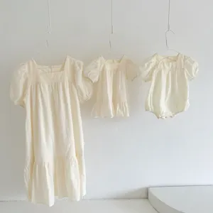 Chic embroidered family matching outfits set featuring delicate puff sleeves and breathable cotton.