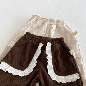 Korean style toddler girls corduroy pants with cute lace trim pockets and comfy design.