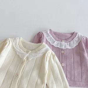 Cute baby knitted cardigan with delicate lace collar, soft autumn toddler outerwear top.