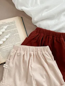 Infant corduroy shorts detail view, featuring soft ribbed texture and comfortable elastic waist.