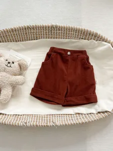 Cute infant corduroy shorts for baby boys and girls, casual elastic waist solid color shorts.