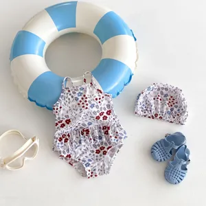 Toddler girls floral print one piece swimsuit set with cap sandals and goggles for beach days.