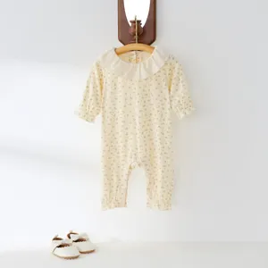 Cute baby floral romper with lotus leaf collar, long sleeve infant jumpsuit for spring wear.