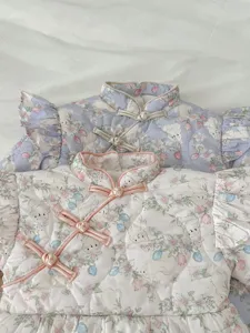 Cute baby girl fleece winter romper detail, floral rabbit print with Chinese buttons.