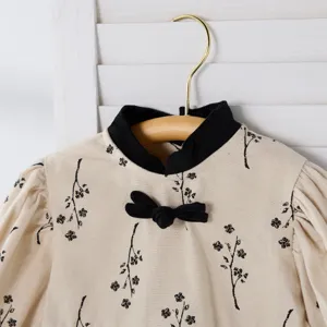 Baby girl spring floral print Chinese style romper detail, black collar puff sleeve bodysuit.