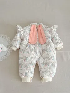 Infant floral quilted jumpsuit detail featuring cute bunny ears and soft fabric for baby girls.