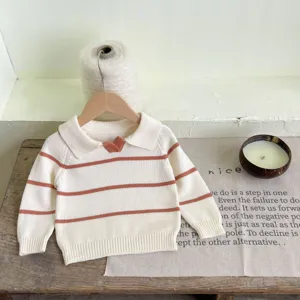 Baby knit sweater featuring a stylish lapel collar and classic brown stripes for autumn.