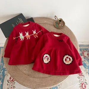 Cute toddler girls red knit dress with handmade rabbit embroidery, cozy fleece lined winter wear.