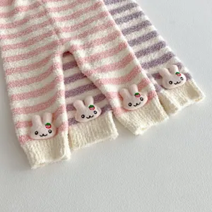 Cute fuzzy rabbit stripe baby pants detail shot, soft winter warm fleece children wear