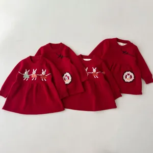 Girls red fleece-lined knit dress with cute handmade rabbit embroidery for babies and toddlers.