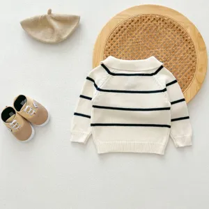 Details of the infant striped knit sweater featuring a classic lapel design and soft fabric.