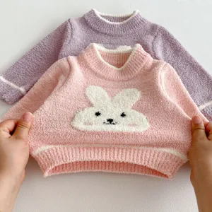 Infant winter plush rabbit sweater detail, soft fluffy fabric, cute cartoon animal design.