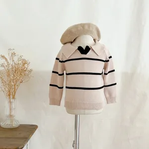 Toddler knit sweater detail showing stylish lapel collar and classic black stripes.