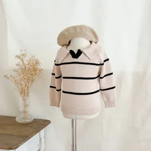 Detailed view of toddler knit sweater showcasing pink stripes and classic lapel collar.