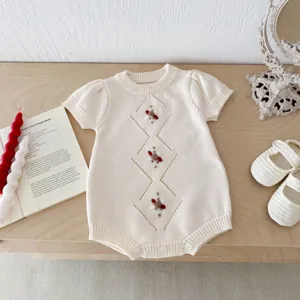Baby knit romper with floral embroidery, short sleeve cute infant bodysuit for daily wear.