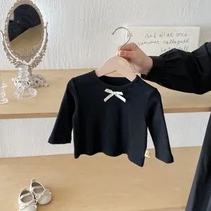 Black toddler long sleeve t-shirt with cute white bow knot, soft ribbed knit baby top.