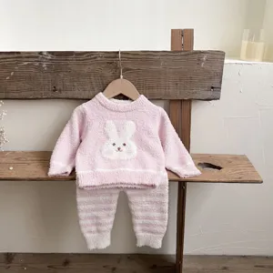 Cozy baby fleece pajama set with cute bunny design, soft warm long sleeve top and striped pants.