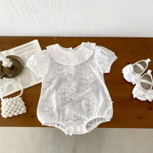 Baby girl white romper detail, cute doll collar, short puff sleeve, fine floral embroidery.