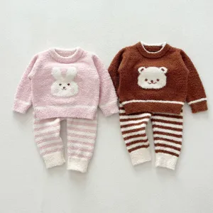 Cute baby fleece sleepwear set featuring cozy rabbit and bear designs for winter.