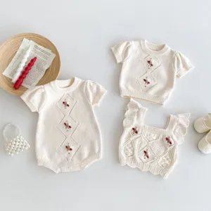 Baby knitted cotton handmade crochet romper and top set for cute infant daily wear.
