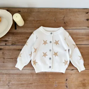 Infant knit cardigan sweater with gold stars detail. Cute baby girl long sleeve cotton top coat for autumn.