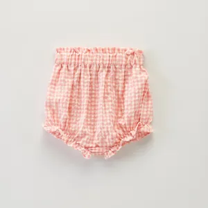 Joli short bouffant à carreaux roses pour bébé fille avec taille élastique et volants d'été.