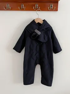Detailed view of the dark navy winter baby quilted romper, retro style warm jumpsuit.