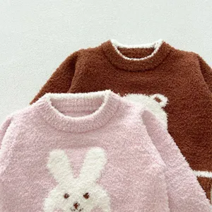 Soft flannel baby winter sweater detail shot featuring cute rabbit and bear cartoon designs.