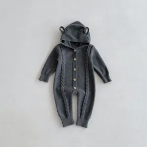 Autumn baby knitted hooded romper with cute bear ears, cable knit texture and wooden buttons.