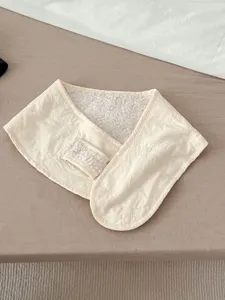 Infant winter fleece warm belly band detail, cozy quilted fabric with soft sherpa lining.