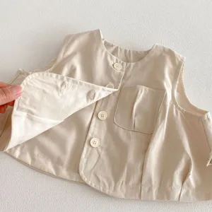 Gilet sans manches pour bébé enfant de printemps unicolore avec boutons et poche.